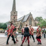 Morris dancers opposite the church.