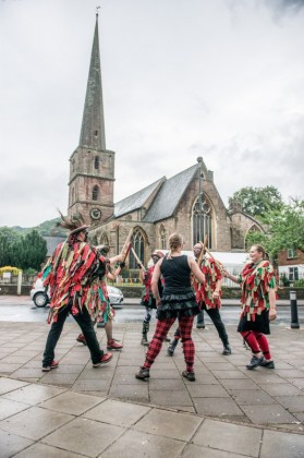 Morris dancers opposite the church.